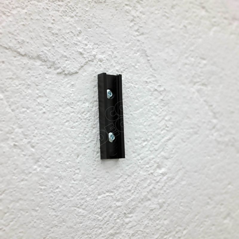 Barrier belt wall mount